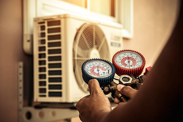 Professional Heat Pump Repair technician working in Idlewild, TN